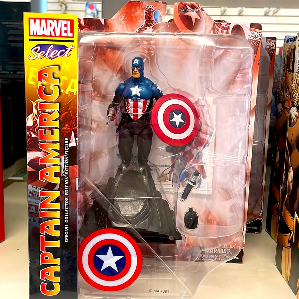 Brand new in box captain America figurine.